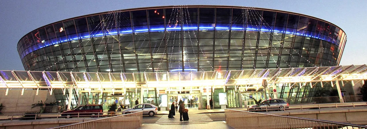 Nice airport terminal illuminated at dusk
